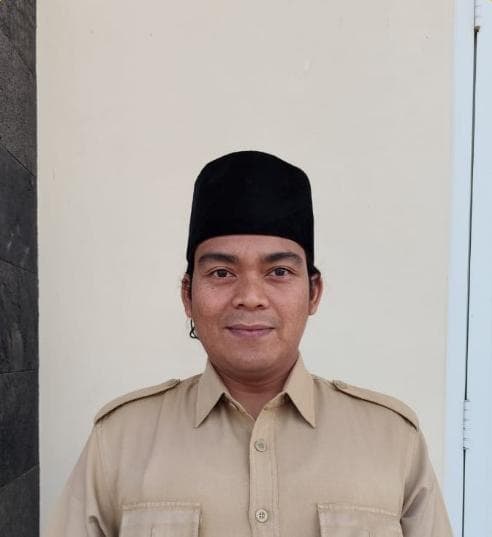 Potret Ratna Adi Kurniawan, Staf Kalurahan Margomulyo.